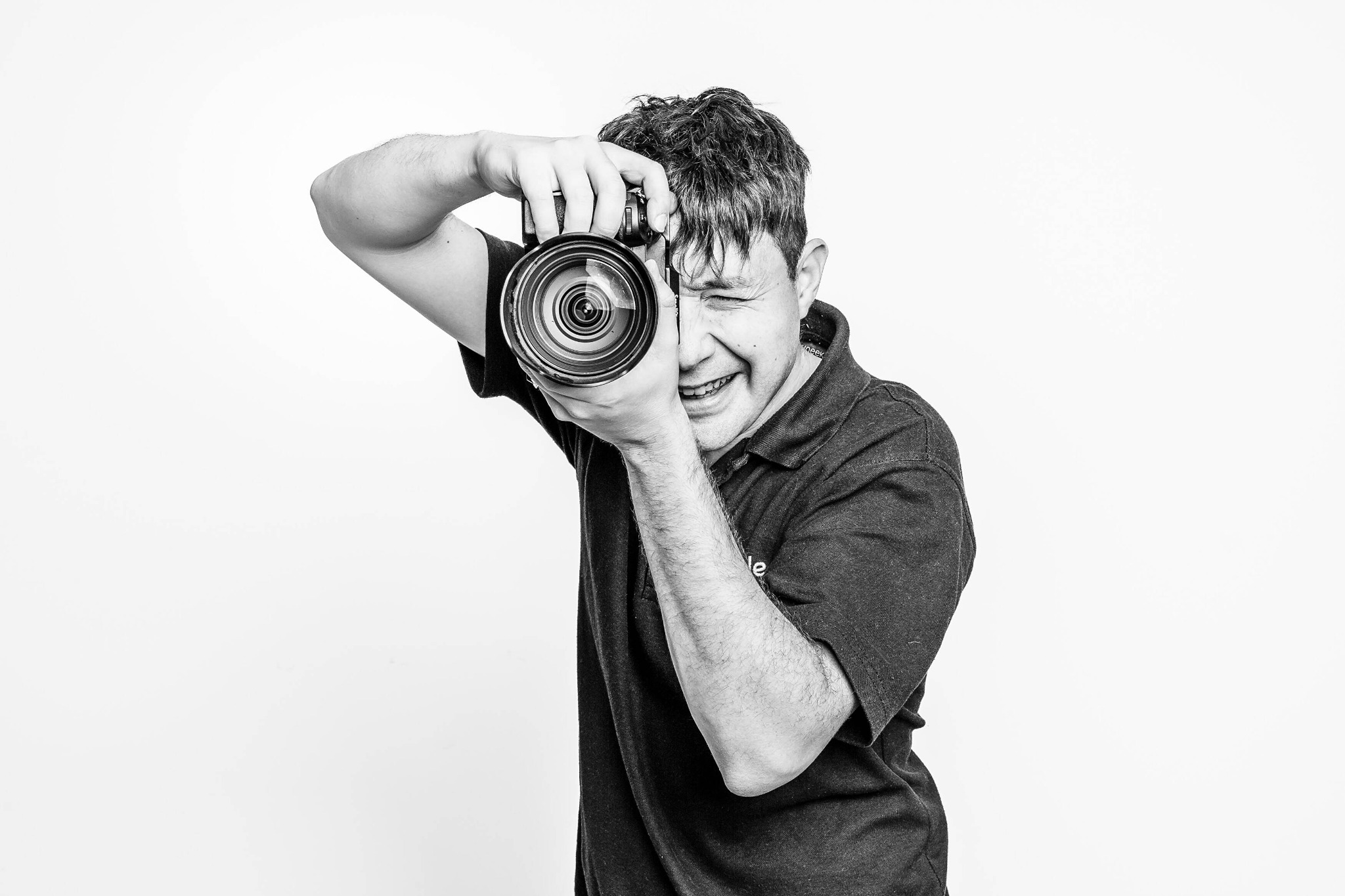 Ben, the photographer and filmmaker behind Nimble, holding his camera